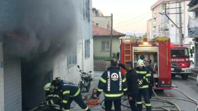 Denizli'de bir caminin altındaki iş yerinde üretim yapan tekstil atölyesinde